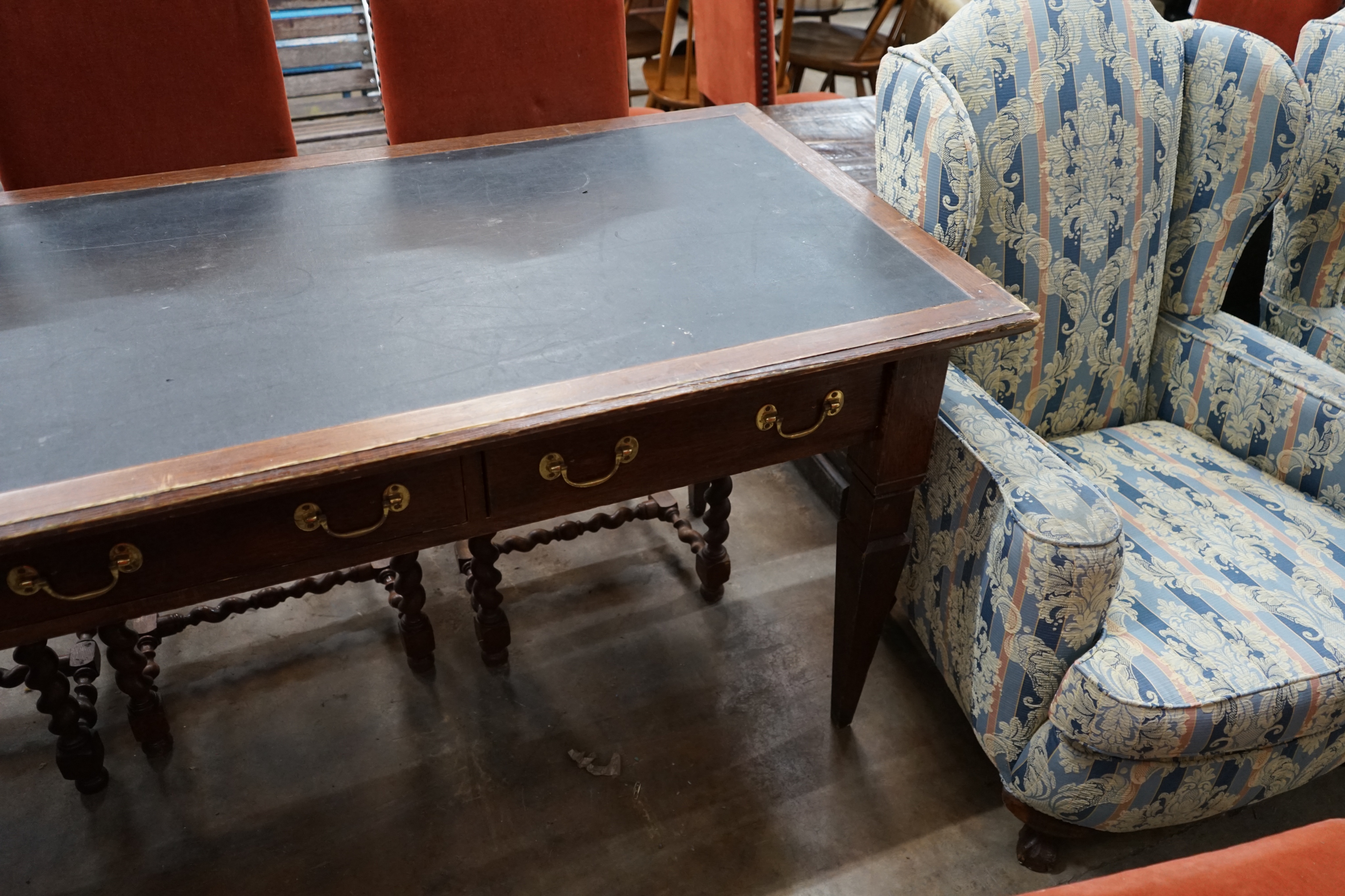 An early 20th century rectangular mahogany three drawer library table, width 190cm depth 79cm height 80cm